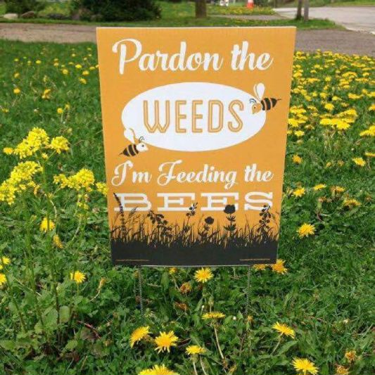 Pardon the weeds sign